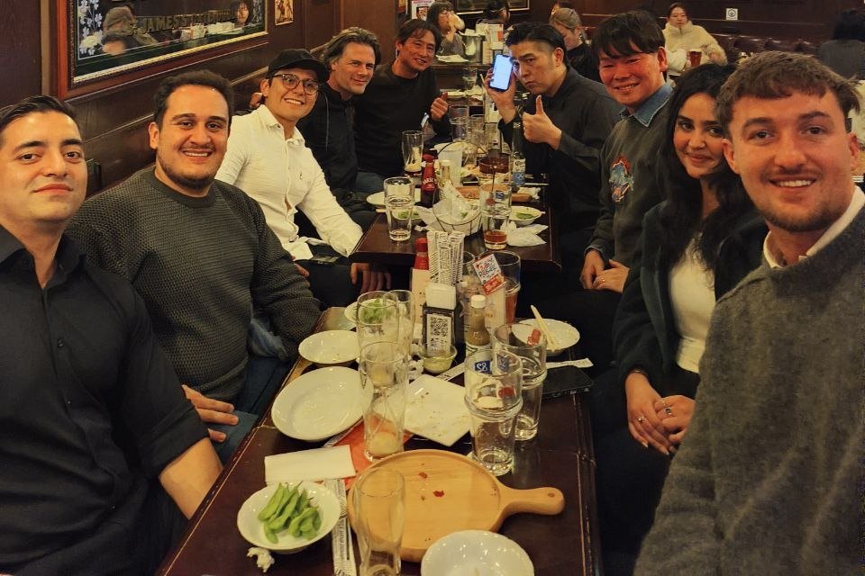 OpenDome founders sharing drinks after a program session